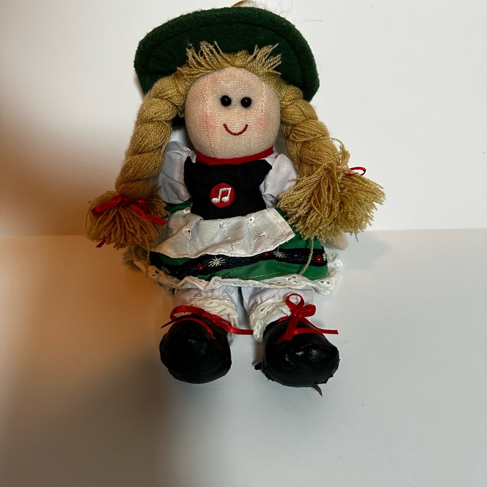 Yodeling German Girl Doll with Braided Blonde Hair and Green Hat